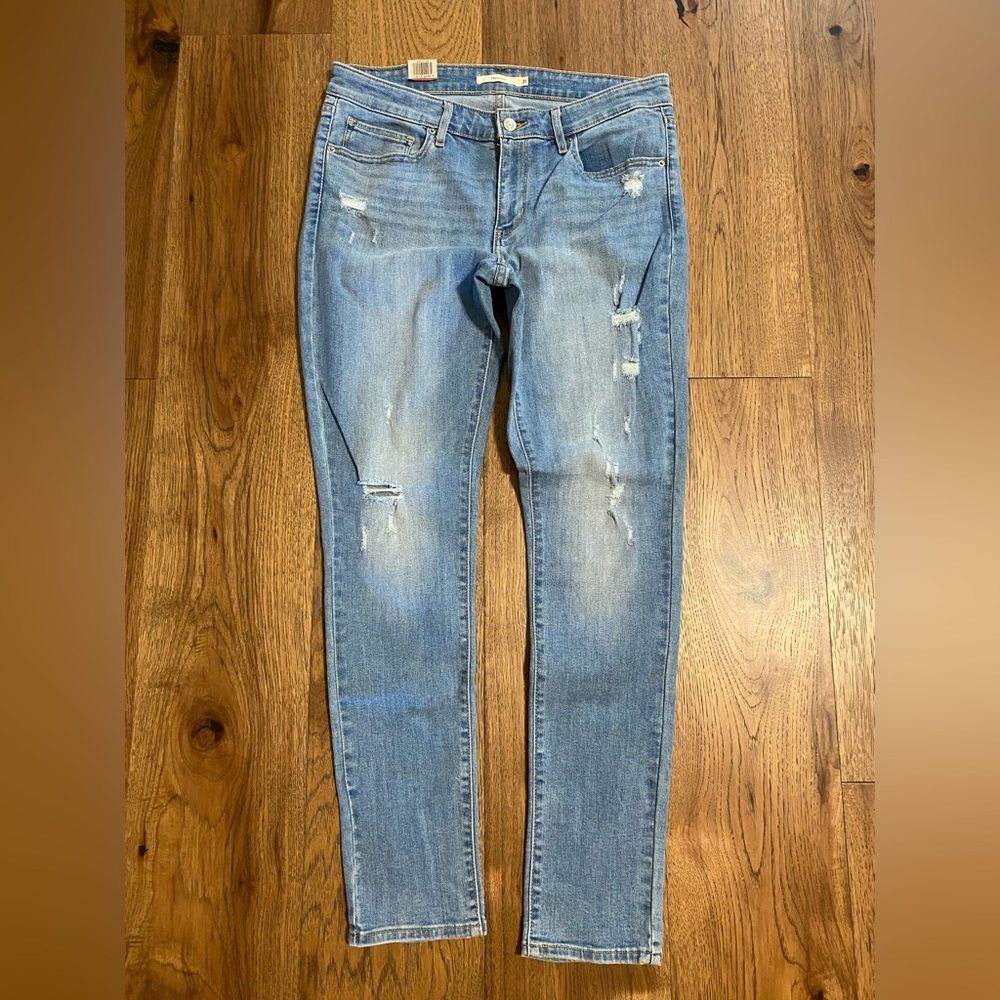 Levi's 711 Skinny Light Blue Denim Distressed Jeans 
Waist 31 Length 30